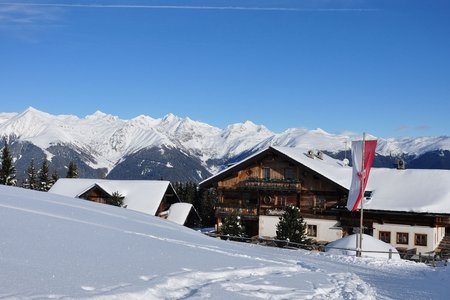 Rastnerhütte vom Parkplatz Zumis